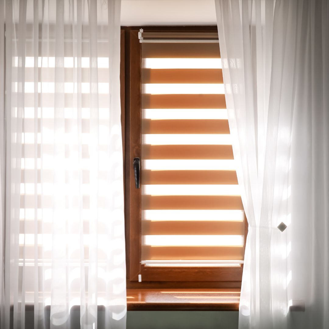 Window with thin curtains