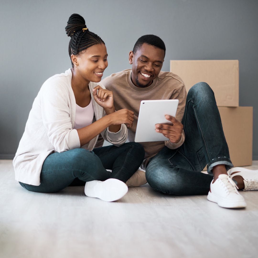 couple looking at a tablet
