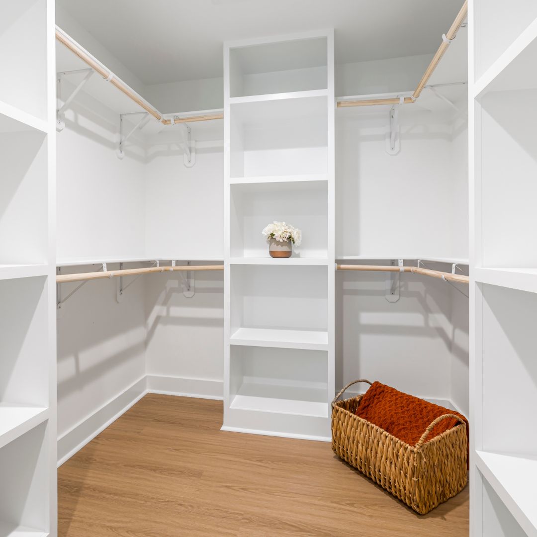 Empty closet with vertical storage