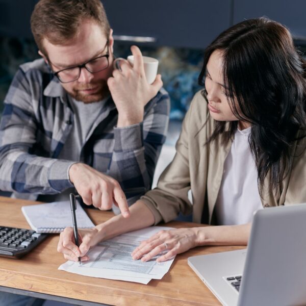 husband and wife looking at their bills