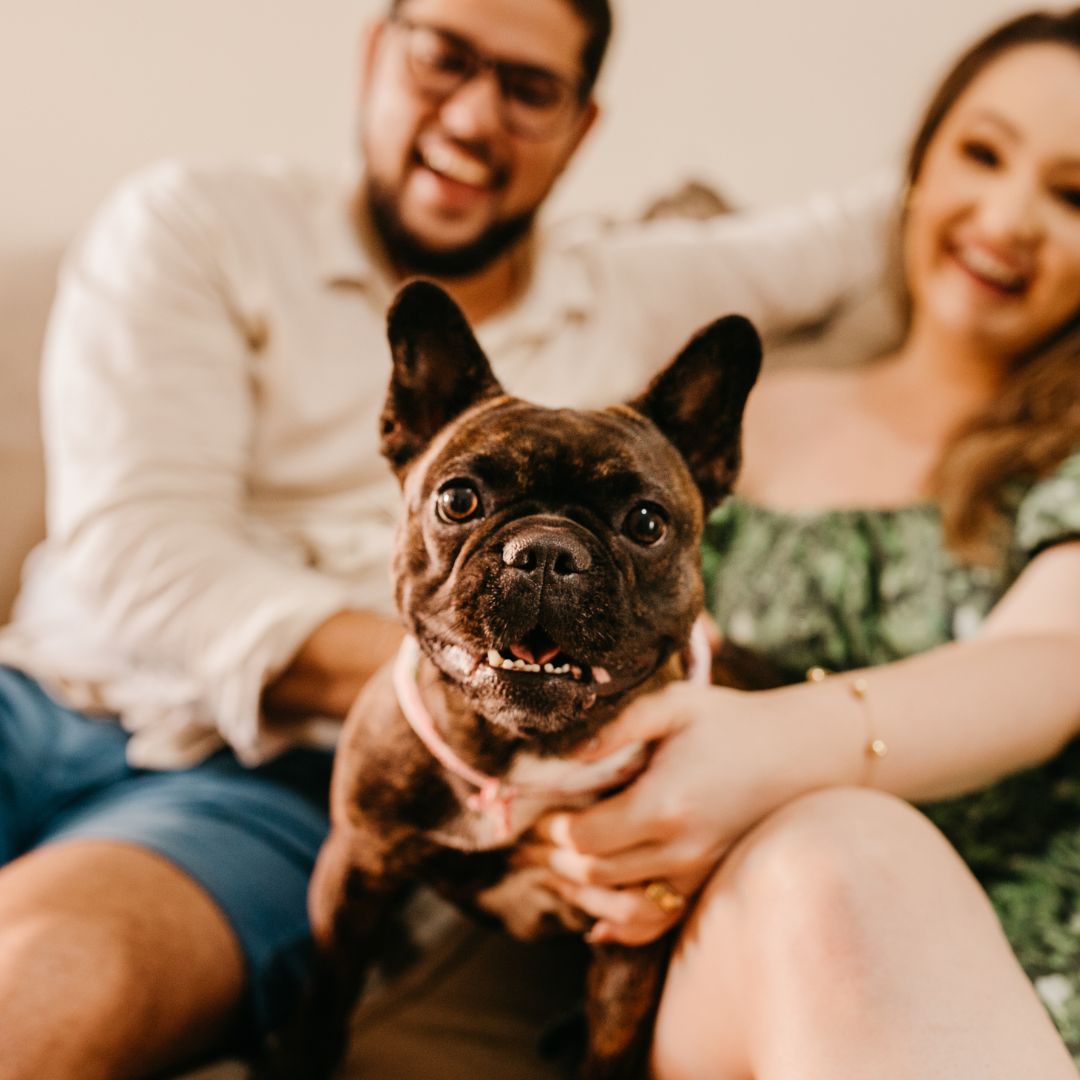 Happy couple with their dog