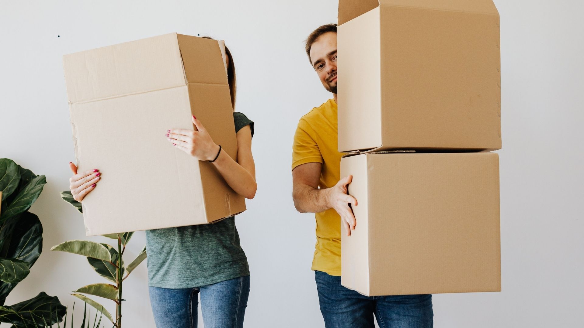 couple with moving boxes